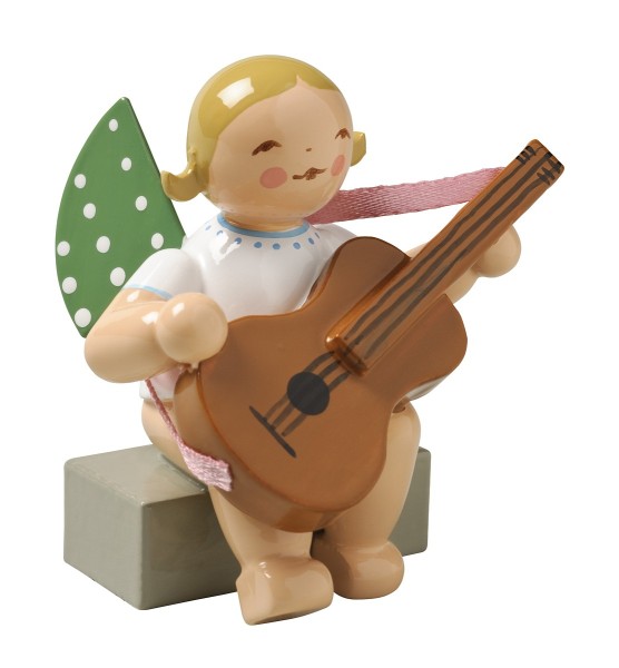 angel with guitar, sitting