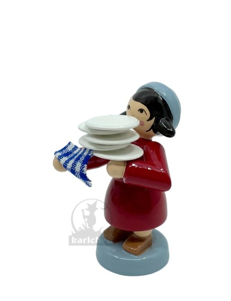 Girl with stack of plates