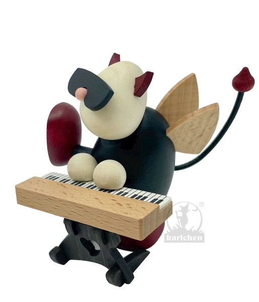Devil Gustav plays keyboard