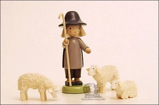 Shepherd with 3 little lambs