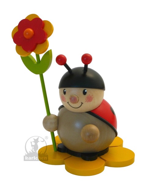 Marienkäfer mit Blume