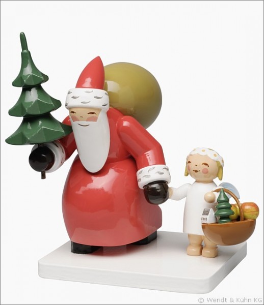 santa claus with tree and angel