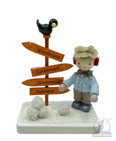 Boy with signpost