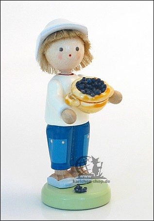 Boy with blueberries