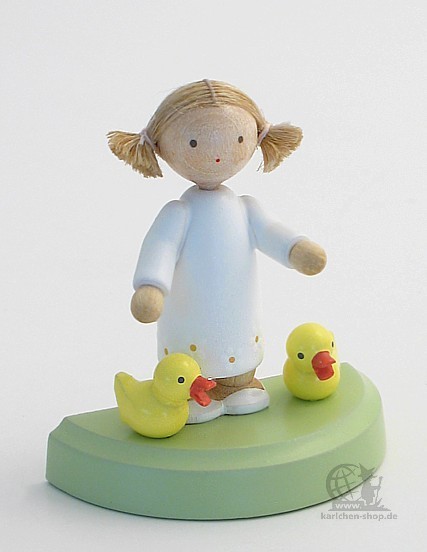Girl with two little ducks