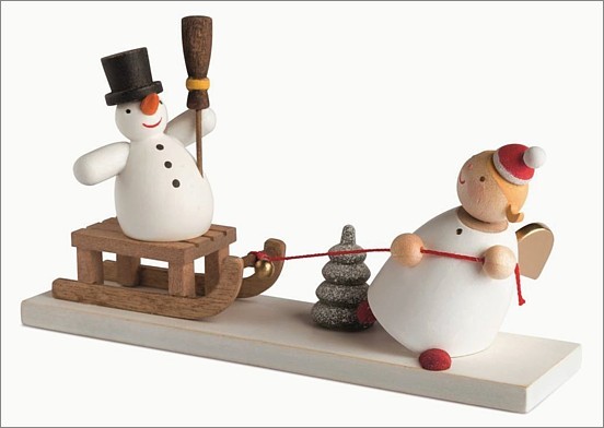Guardian angel with snowman sledge