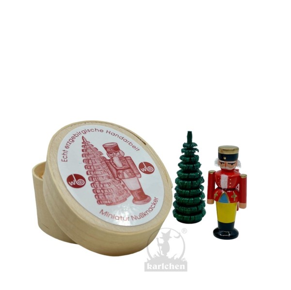 Splinter box with nutcracker and wooden tree