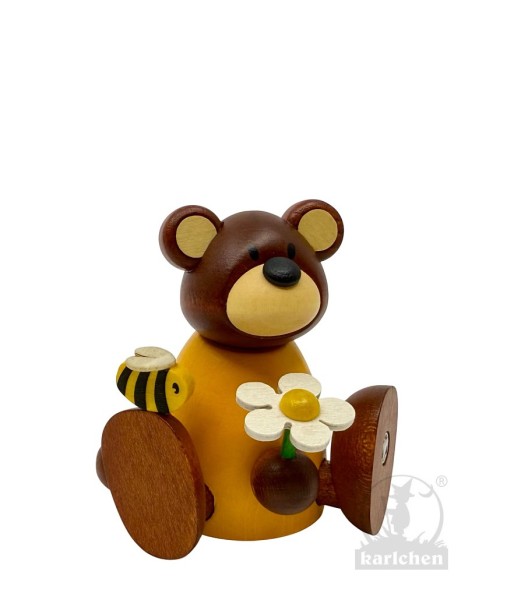 Bärbel sitting with flower