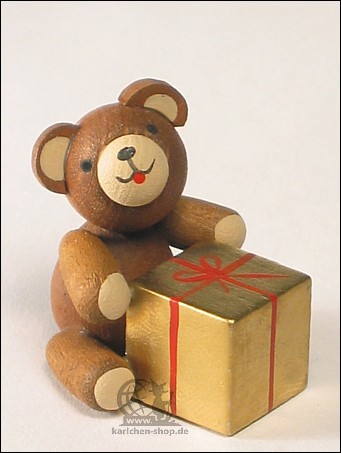 Good-luck bear with gift