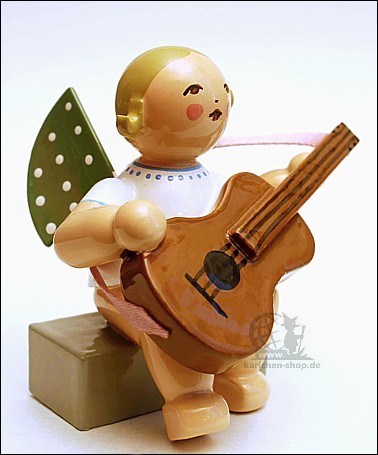 angel with guitar, sitting