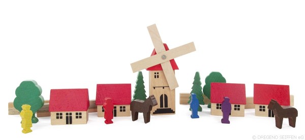 Dorf aus Holz mit Windmühle