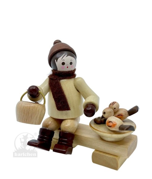 Junge mit Vögelchen