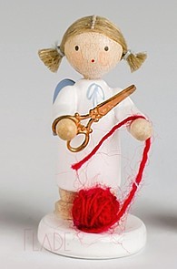 Angel with scissors and ball of wool