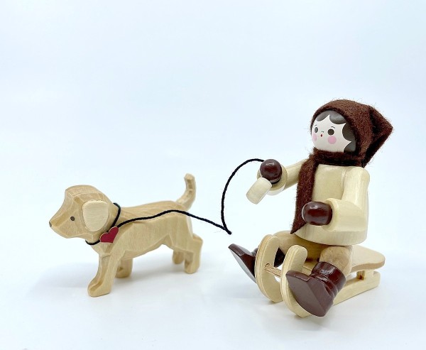 Girl with dog sled