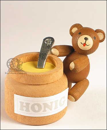 Good-luck bear with honey pot