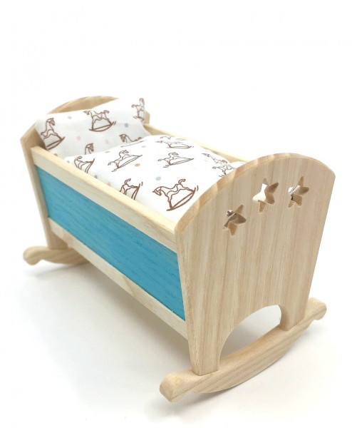 Cradle with pillow and blanket